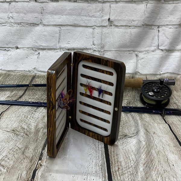 A beautiful Bacote wood fly box handcrafted and sleek design.