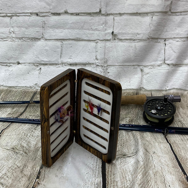 A beautiful Bacote wood fly box handcrafted and sleek design
