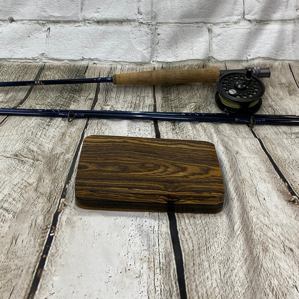 A beautiful Bacote wood fly box handcrafted and sleek design