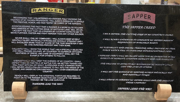 Laser engraved black granite with two elite military creeds, the Ranger Creed and the Sapper Creed.  After laser engraving it was color filled the Ranger tab with gold, the Sapper tab with red and both creed lettering in white.