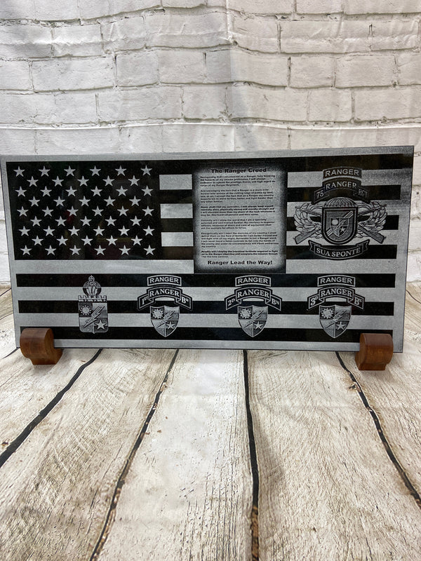 The 75th Ranger Regiment is an elite fight force for the US Army. So we made this flag for those hard-hitting warriors. This black granite laser engraved flag has The Ranger Creed, 75th Ranger Regiment tab, crest, 75th Ranger Regimental crest and all three battalions tabs.