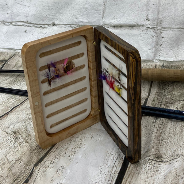 Bobcote and curly maple fly box. Has a fly rod and flies in the fly box for display prepose only. Product you get is only the fly box.